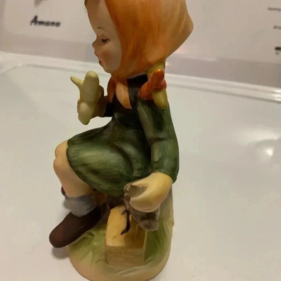 Girl Designed Figure Eatting a Banana on a Tree Stump - Picture 2 of 5